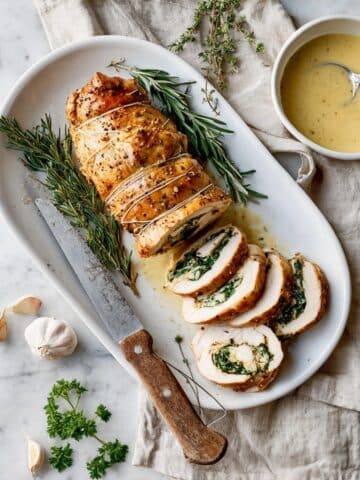Spinach and Ricotta Stuffed Turkey Breast with Garlic Herb Sauce Recipe
