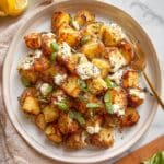 Roasted Potatoes with Baked Feta, Garlic, and Herbs Recipe