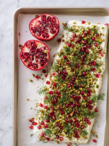 Festive Salmon with Greek Yogurt, Feta, Pomegranate, and Pistachios Recipe
