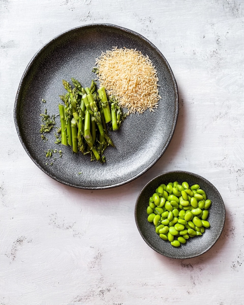 A white plate filled with a green and white rice dish, where the top layer consists of cooked green beans and fresh spinach leaves mixed with white rice grains. The rice looks soft and light, with small bits of green peas scattered throughout. The plate sits on a white marbled surface scattered with loose grains of uncooked rice around it. photo taken with an iphone --ar 4:5 --v 7