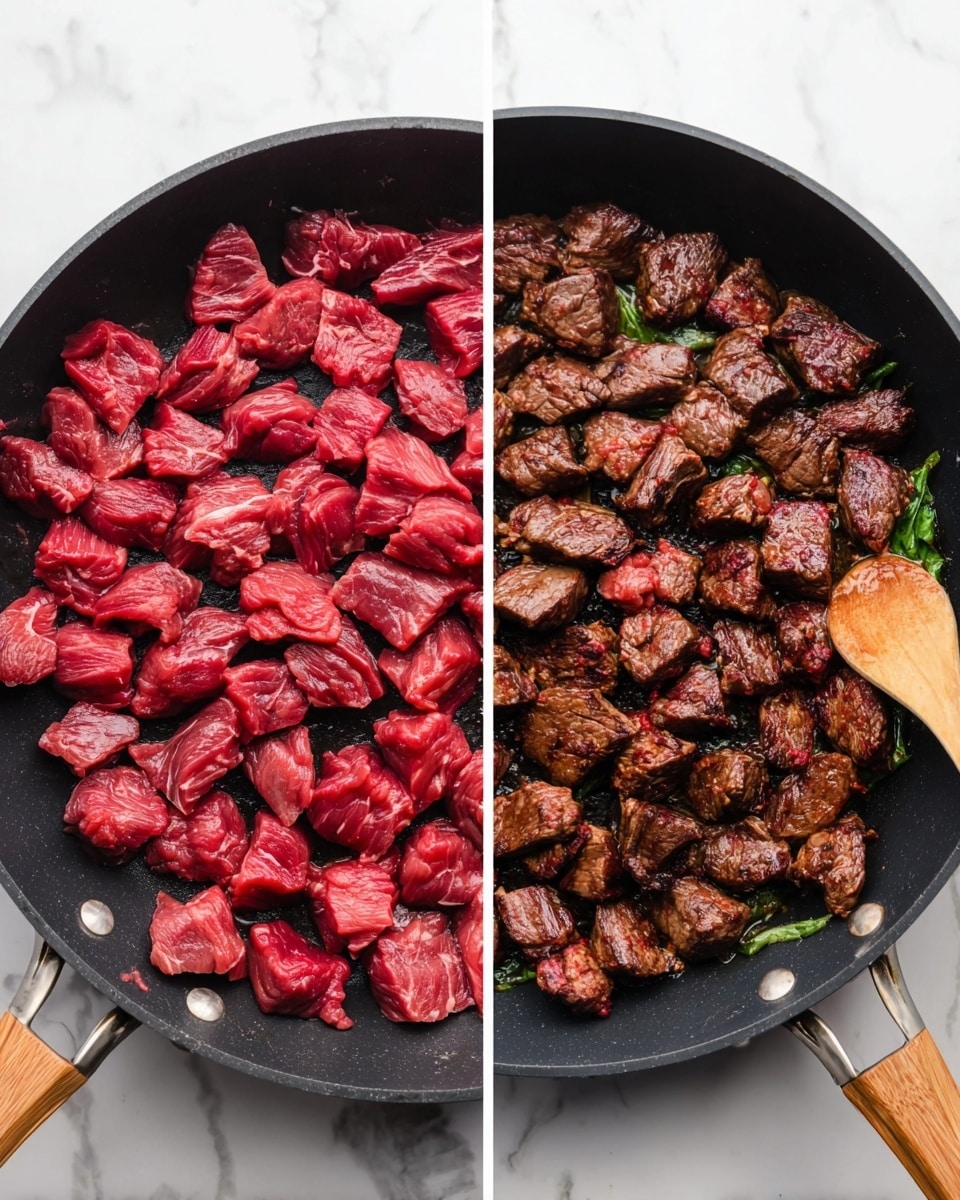 The image shows a black pan filled with cooked steak pieces and golden-brown potato chunks mixed together. The steak pieces are browned with some pink in the middle, showing a juicy texture, and the potatoes have a crispy and slightly rough surface. Green chopped herbs are sprinkled on top, adding a fresh color contrast. Around the pan, there are whole green herb leaves and a small white bowl with more chopped herbs on a white marbled surface. The photo taken with an iphone --ar 4:5 --v 7
