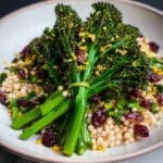 Grilled Broccolini Salad with Barley, Pistachios, and Cranberries Recipe