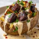 Loaded Baked Potato with Steak Bites and Parmesan Cream Sauce Recipe