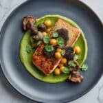 Seared Steelhead Trout with Truffled Pea Sauce, Roasted Baby Potatoes, and Sautéed Mushrooms Recipe