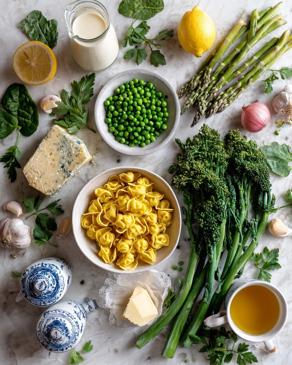 A white bowl filled with creamy tortellini pasta mixed with bright green peas and tender asparagus pieces, topped with finely grated white cheese and small yellow lemon zest curls. Dark green broccolini adds a textured leafy layer, with fresh green herb bits scattered throughout. A gold fork lifts some tortellini on the left side of the bowl. The bowl sits on a white marbled surface with fresh lemon half, green herbs in a small white bowl, and asparagus stalks nearby, creating a fresh and vibrant look. Photo taken with an iphone --ar 4:5 --v 7
