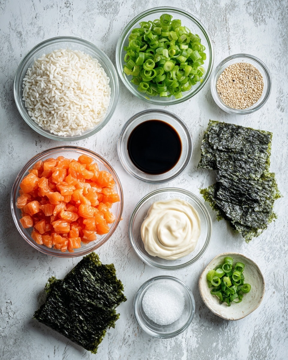 The image shows small clear glass bowls arranged on a white marbled textured surface, each holding different ingredients for making sushi. There is a bowl of white rice grains, a bowl of bright orange diced salmon, a bowl of chopped green spring onions, a bowl of dark soy sauce, a bowl with black and white sesame seeds, a bowl of white powdery salt, and a bowl of creamy white mayonnaise. Next to the bowls is a small stack of dark green sheets of dried seaweed. The setting is bright and clean with all ingredients clearly visible. Photo taken with an iphone --ar 4:5 --v 7
