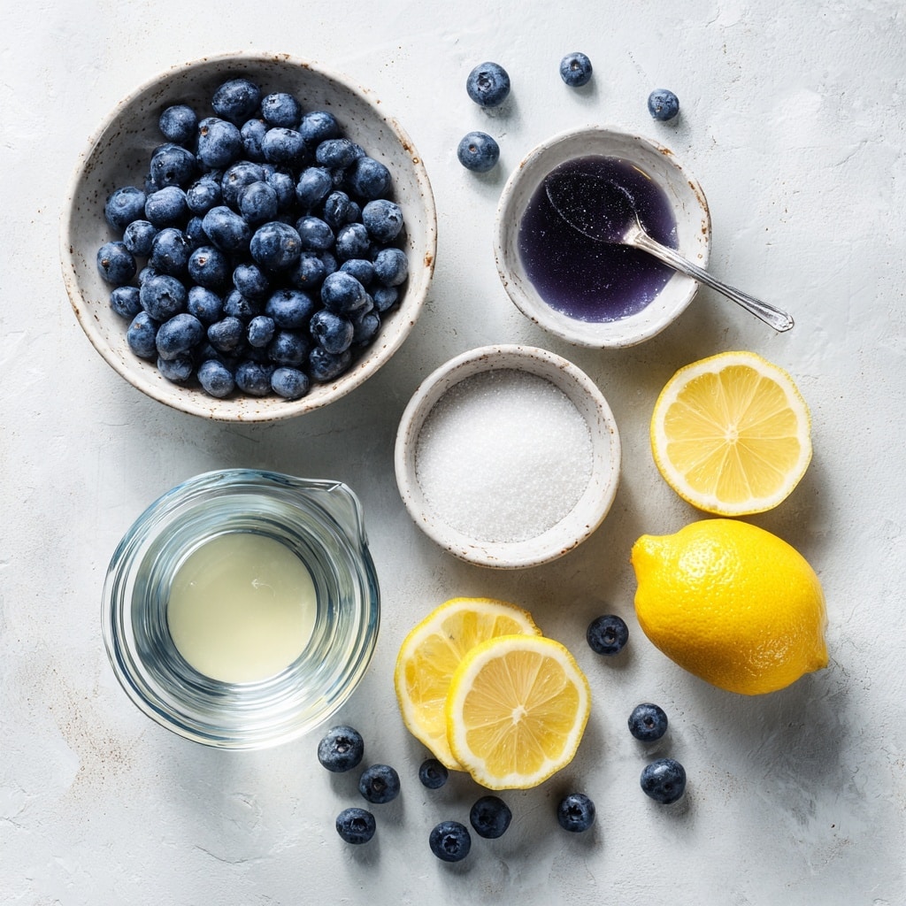 A spoon held by a woman's hand with red nail polish lifts thick, dark purple blueberry jam filled with whole blueberries from a small cream-colored bowl with a brown rim. The bowl sits on a round metal tray with a few loose blueberries scattered around it on a white marbled surface. In the background, there is a white plate stacked with golden-brown waffles, slightly out of focus. A grey striped cloth napkin lies on the white marbled surface near the bowl. photo taken with an iphone --ar 4:5 --v 7