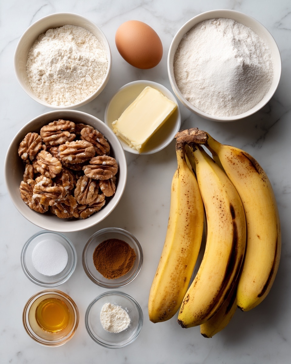 On a white marbled surface, three ripe bananas with dark brown spots lie together at the bottom right. Above them is a small block of butter, light cream in color, next to a medium brown egg. To the top right, a small white bowl is filled with white sugar, beside a larger white bowl of white flour with a fluffy texture. On the left side, another white bowl is filled with medium brown walnuts. Below the bowls, small clear glass bowls hold different ingredients: light brown cinnamon, white salt, white baking soda, white baking powder, and golden honey. The ingredients are evenly spaced and arranged neatly. Photo taken with an iphone --ar 4:5 --v 7