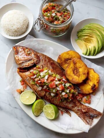 Crispy Pescado Frito with Tostones, Aji Picante, and Fresh Avocado Recipe