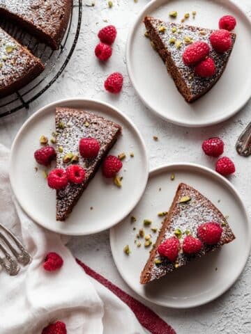 Gluten-Free Honey Almond Cake with Raspberries, Orange, and Pistachios Recipe