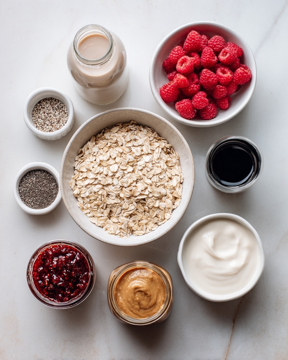 A white bowl filled with light tan rolled oats sits in the center on a white marbled surface. Surrounding it are seven small containers: at the top left, a clear glass bottle with light beige milk, to the top right, a white bowl filled with fresh red raspberries; next to it to the right is a small dark glass bottle holding a black liquid. On the bottom right, a white bowl contains creamy white yogurt. Below that is a small glass jar of smooth light brown peanut butter. To the left of that is a small glass jar filled with thick red raspberry jam with seeds visible. On the bottom left, a small white bowl holds tiny black chia seeds. The overall layout is neat and evenly spaced, with soft lighting coming from above. Photo taken with an iphone --ar 4:5 --v 7