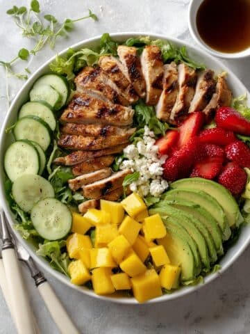Tropical Mango Salad with Grilled Chicken, Feta, and Candied Pecans Recipe