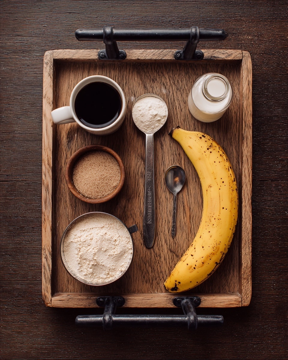 A wooden tray with black metal handles holds six items arranged neatly: a yellow banana with brown spots on the right side, a small white cup with dark liquid near the top left, a metal spoon with white powder in the center, a small clear bottle with white liquid on the top right, a small wooden cup filled with brown powder in the center bottom, and a metal measuring cup filled with light beige powdered flour on the bottom left. The tray sits on a dark brown textured surface. Photo taken with an iphone --ar 4:5 --v 7