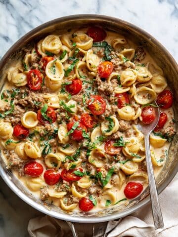 Tomato Basil Pasta with Sausage and Creamy Parmesan Sauce Recipe