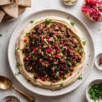 Lamb Hummus with Spiced Ground Lamb, Pomegranate Seeds, and Toasted Pine Nuts Recipe