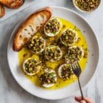 Marinated Goat Cheese with Pistachios, Orange Zest, and Honey Recipe