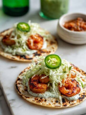 Chipotle Shrimp Tacos with Jalapeño Slaw and Avocado Crema Recipe