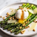 Roasted Asparagus Salad with Poached Eggs, Parmesan, and Toasted Pine Nuts Recipe