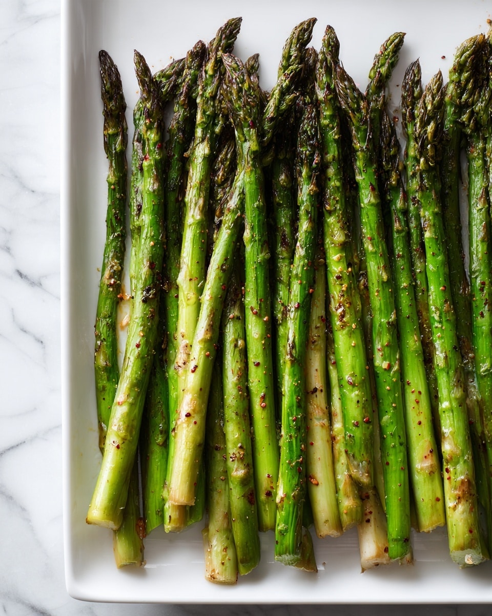 Roasted Asparagus Salad with Poached Eggs, Parmesan, and Toasted Pine Nuts Recipe - Recipe Image